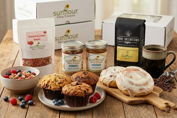 The Breakfast Bakery Box from Sunflour Baking Company is displayed on a wooden table.
