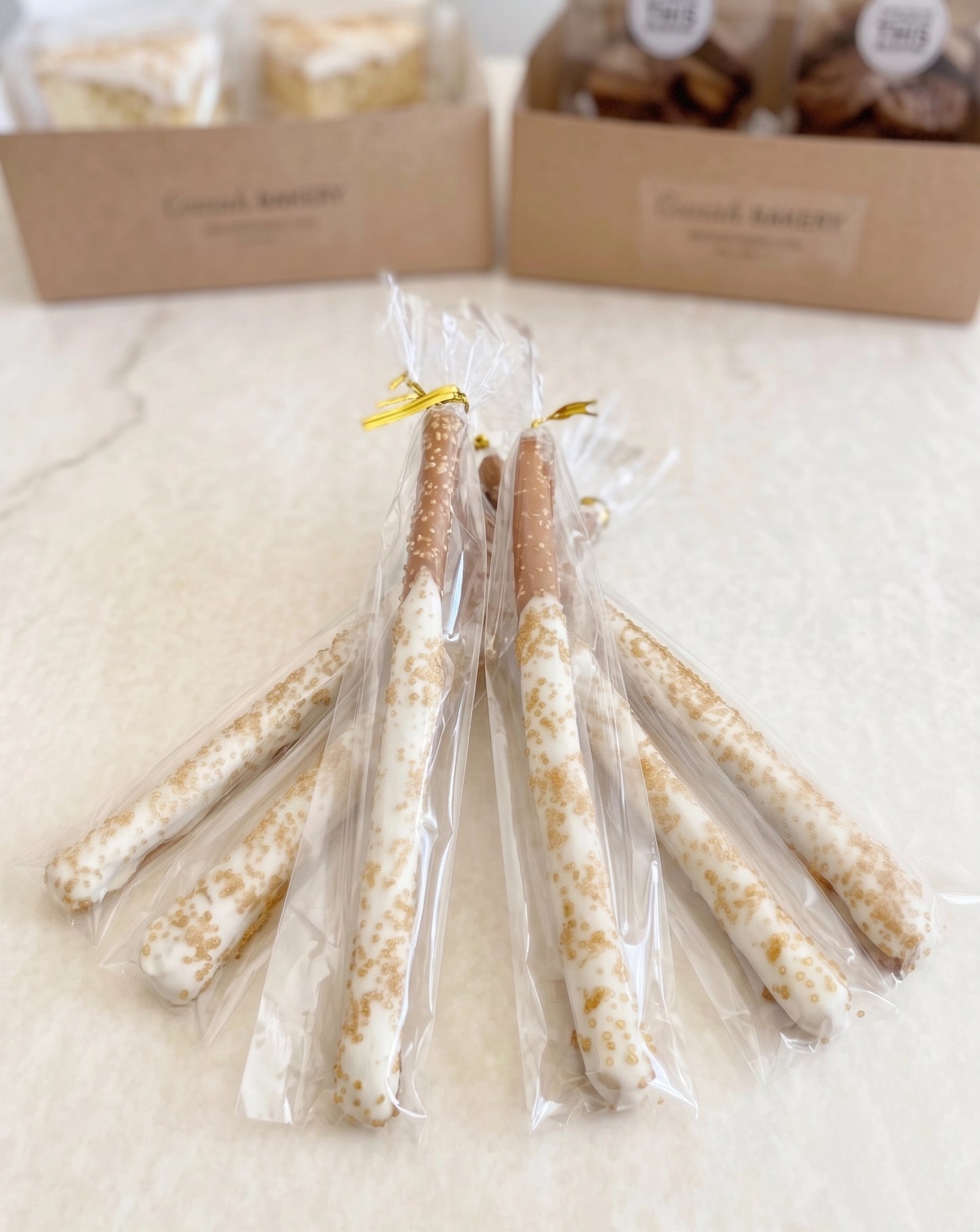 Six chocolate-dipped pretzel rods from Sunflour Baking Company are a perfect addition to the Cookie Gift Basket.